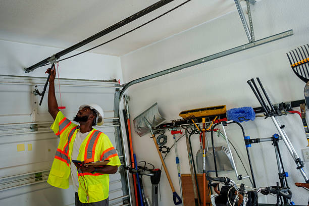 Professional Garage Door Panel Replacement technician working in Boone, IA